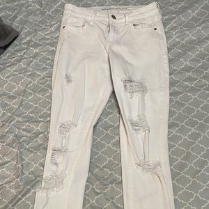 White Hugh waisted womens ripped jeans.